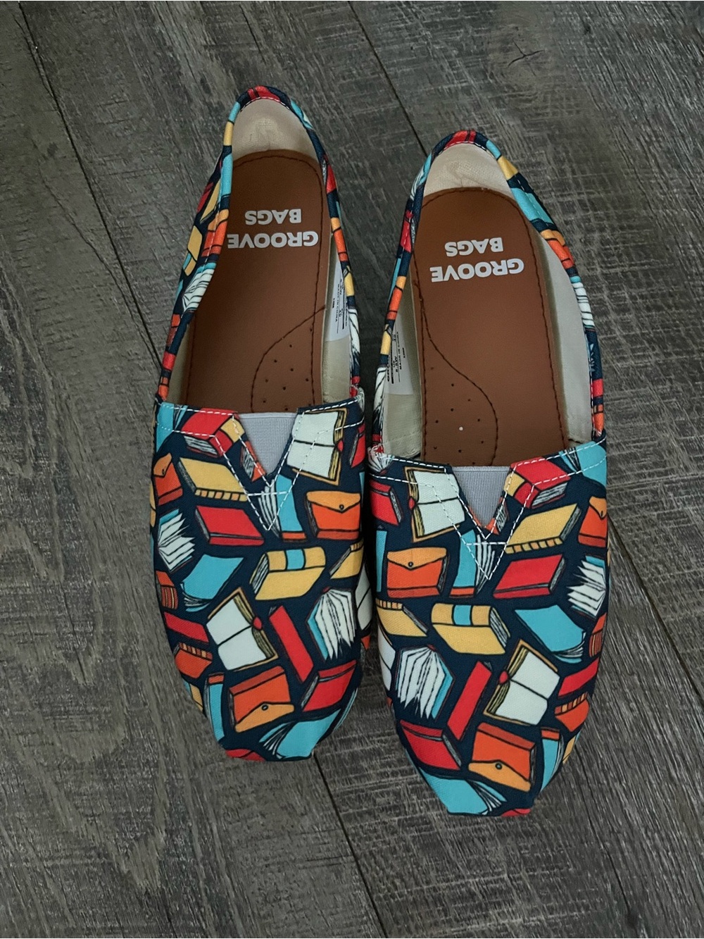 Groove Bag Navy Slip-On Flats with Red, Yellow & Teal Book Print